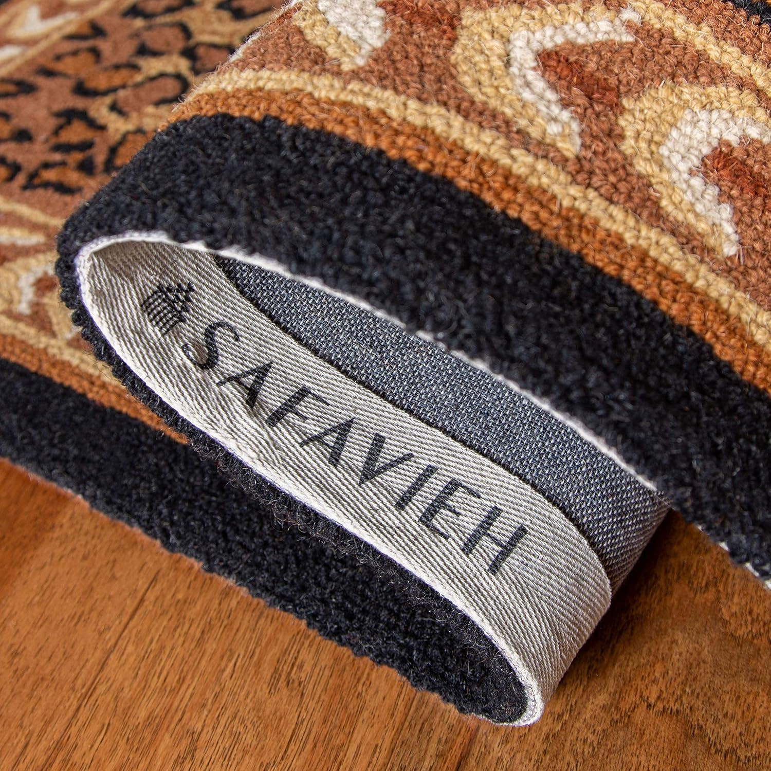 SAFAVIEH Chelsea Collection Area Rug – 7’6″ X 9’6″ Oval, Black & Brown, Hand-Hoo