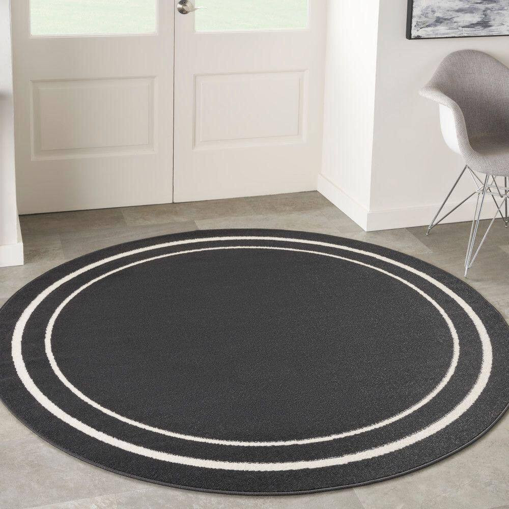 Nourison Essentials Black Ivory 4 Ft. X 4 Ft. Solid Contemporary round Area Rug