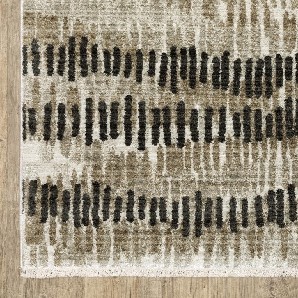 6′ X 9′ Beige Ivory Charcoal Brown Tan And Grey Abstract Power Loom Stain