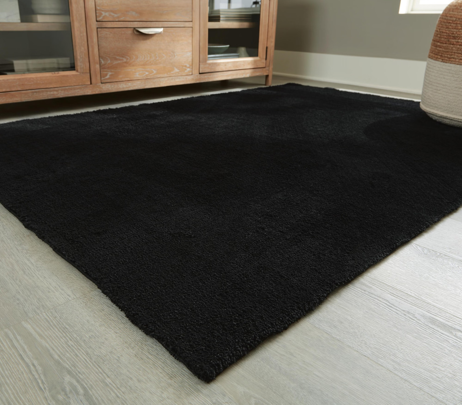 Signature Design by Ashley Annaben 5′ x 7′ Rug, Black