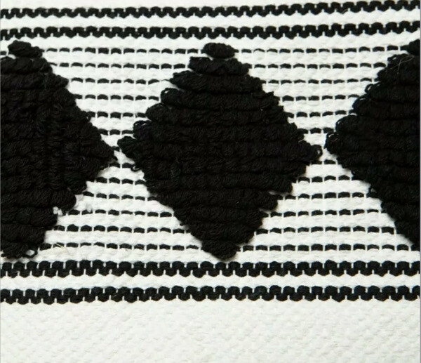 Caravan Diamond Woven Rug from FabFitFun black/white woven rug retail $48.00