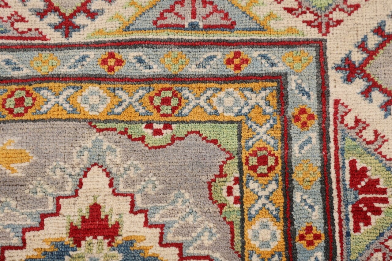 5×7 Geometric Purple & Oranges Hand-Knotted Wool Area Rug