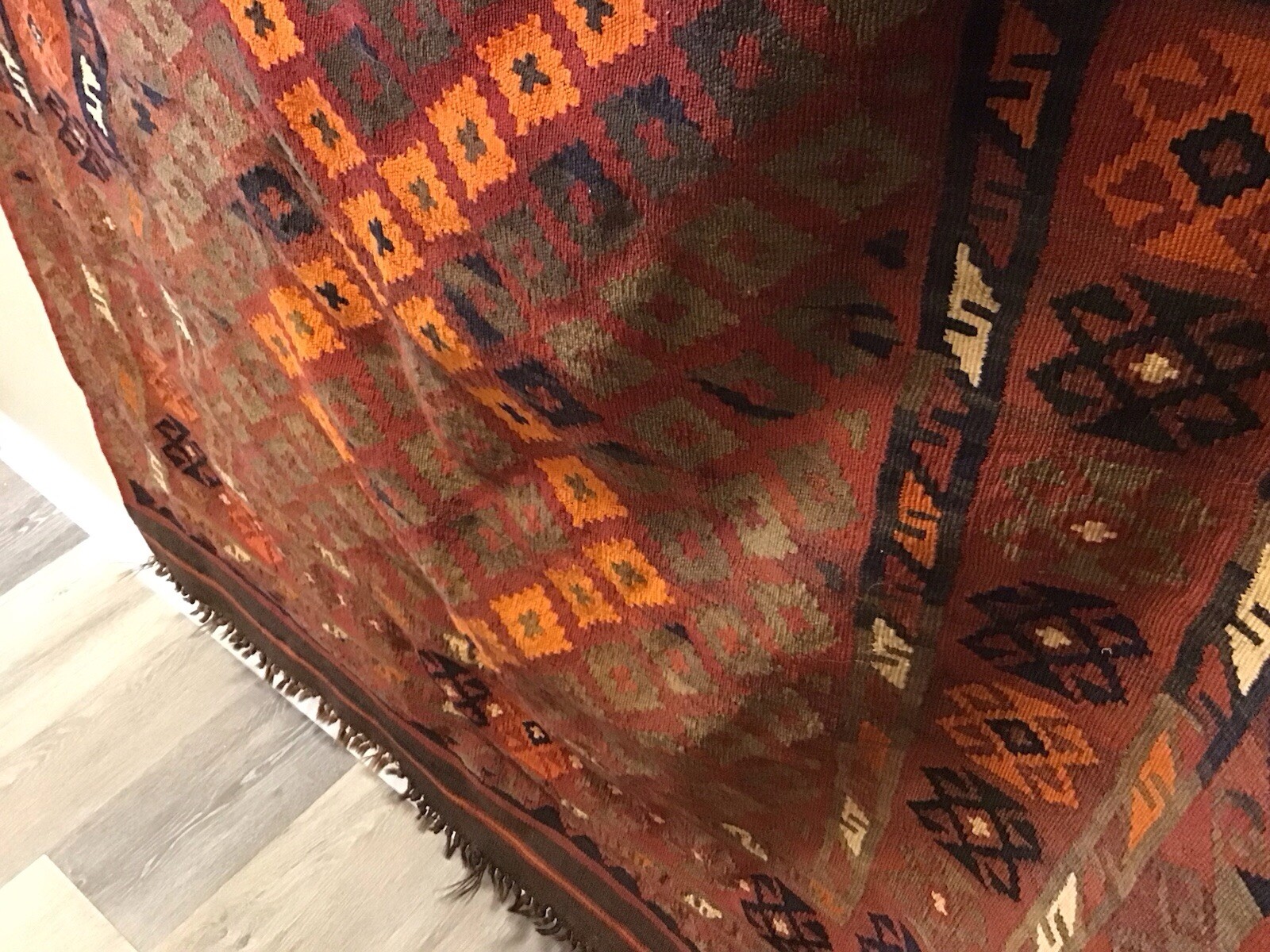 Accent Rug Orange Black and Rust White Color 6’10” long by 3’ 10” wide