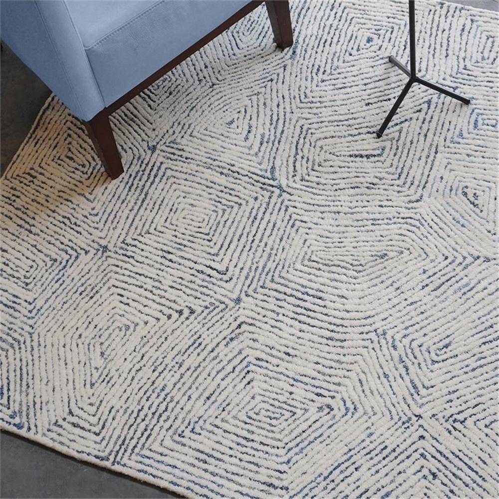 Maklaine Hand Tufted 108×144″ Wool & Recycled Rug in Ivory and Denim Blue