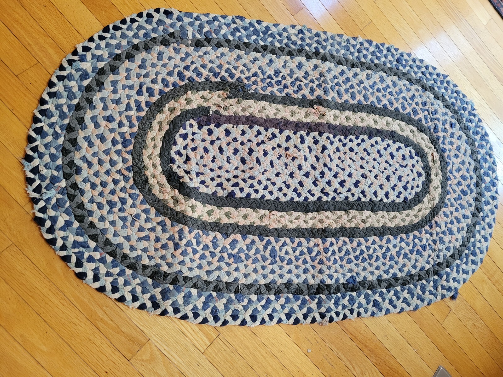 Vintage or antique hand sewn braided rug 32 x 54 inches blue oval