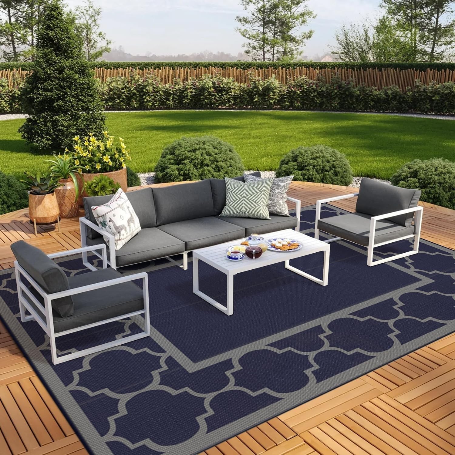 Our 9′ x 18′ Outdoor Rug: Foldable, Reversible in Blue & Grey for Every Occasion