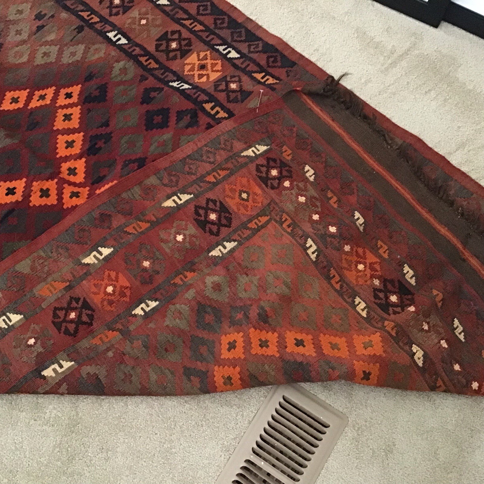 Accent Rug Orange Black and Rust White Color 6’10” long by 3’ 10” wide