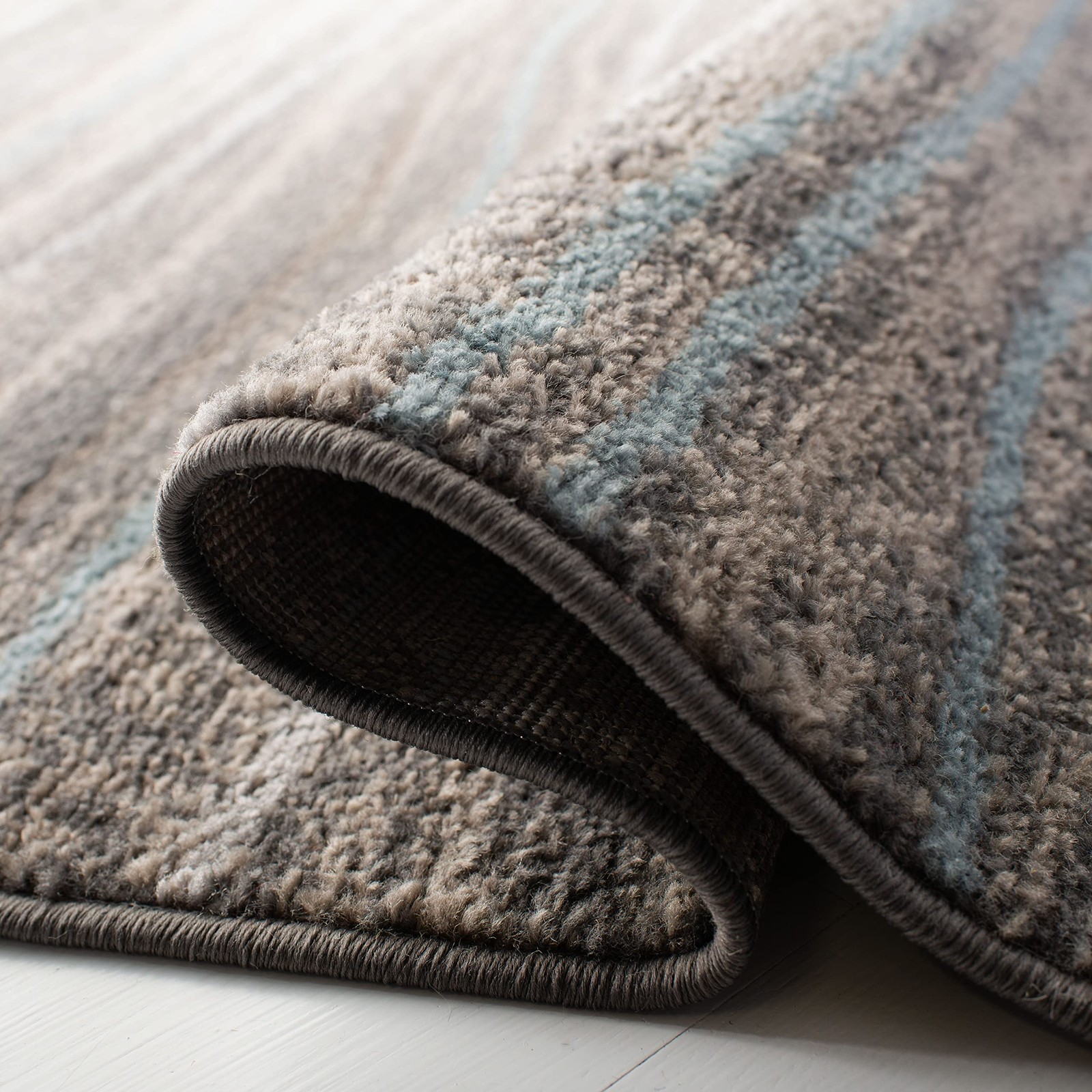 Safavieh Amsterdam Collection Area Rug – 51 X 76 Modern Stripe Wave Design Care