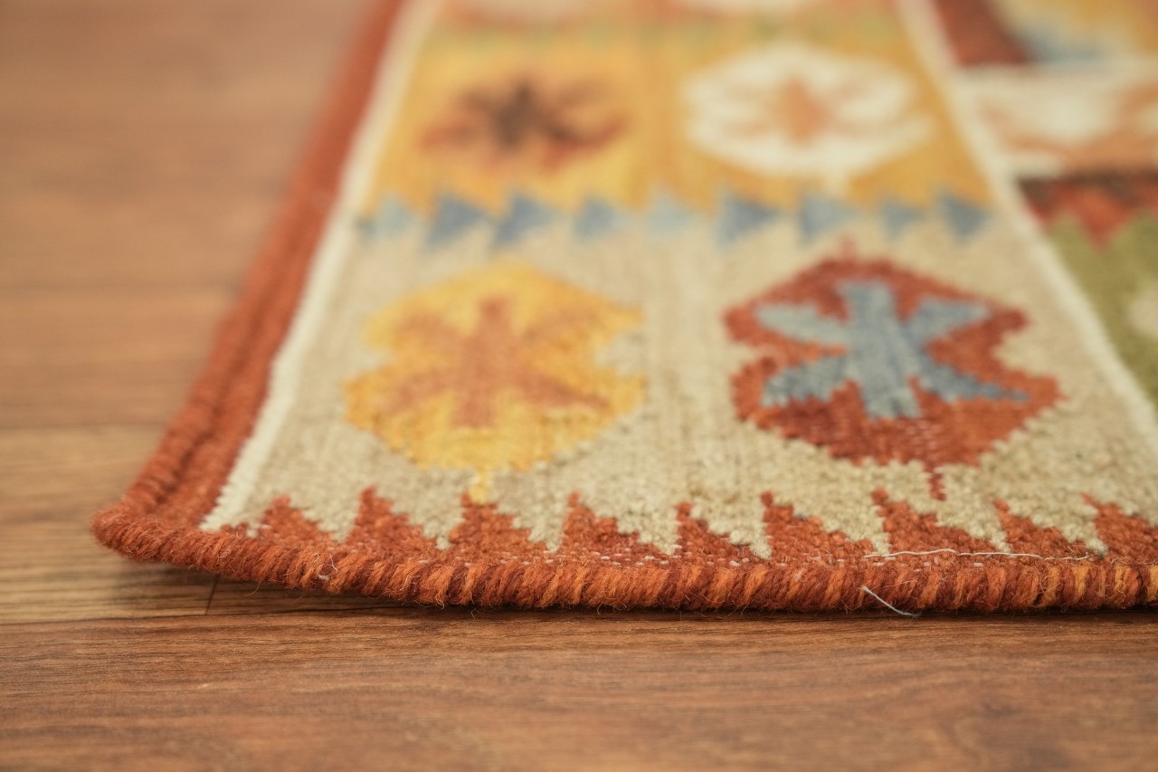 Earthy Hues Meet Traditional Motifs in 5×8 Modern Tribal Rug