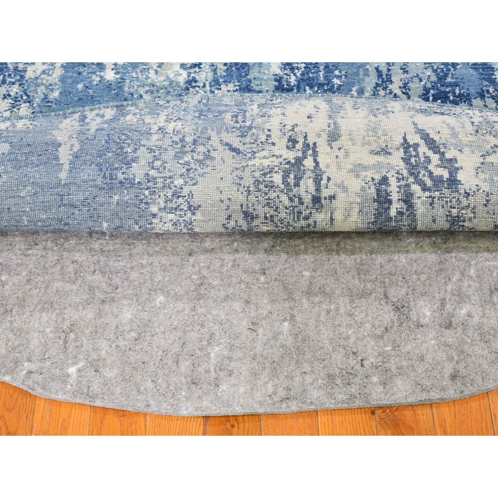 8’1″x10’1″ Blue Abstract Design Wool and Real Silk Oval Hand Knotted Rug R59521
