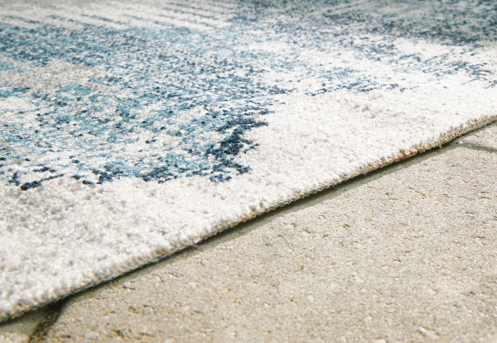 Signature Design by Ashley Daddridge 5′ x 7′ Rug, Blue, Gray, & Ivory