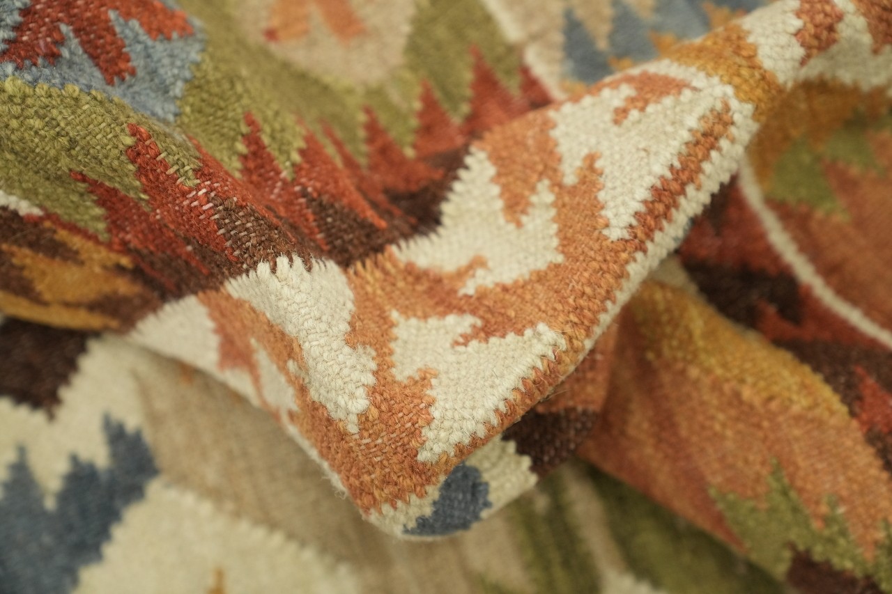 Earthy Hues Meet Traditional Motifs in 5×8 Modern Tribal Rug