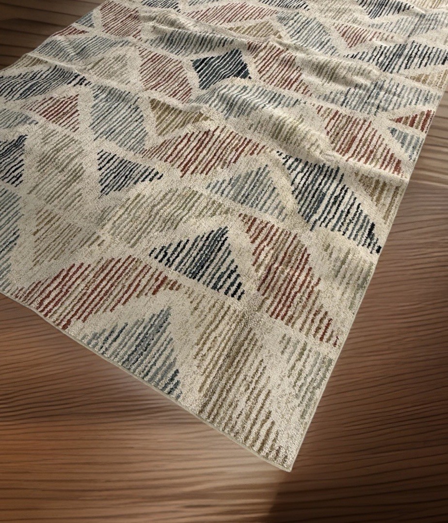 8ft X 10ft ORIAN RUG. Lightly used. Great condition. No stains. 89in X 129in