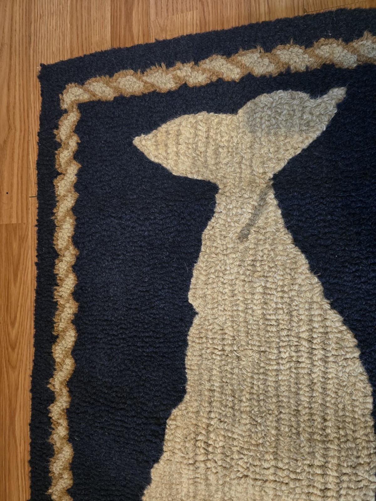Chandler Four Corners “White Whale on Blue” hooked wool By Laura Megroz 2’x4′