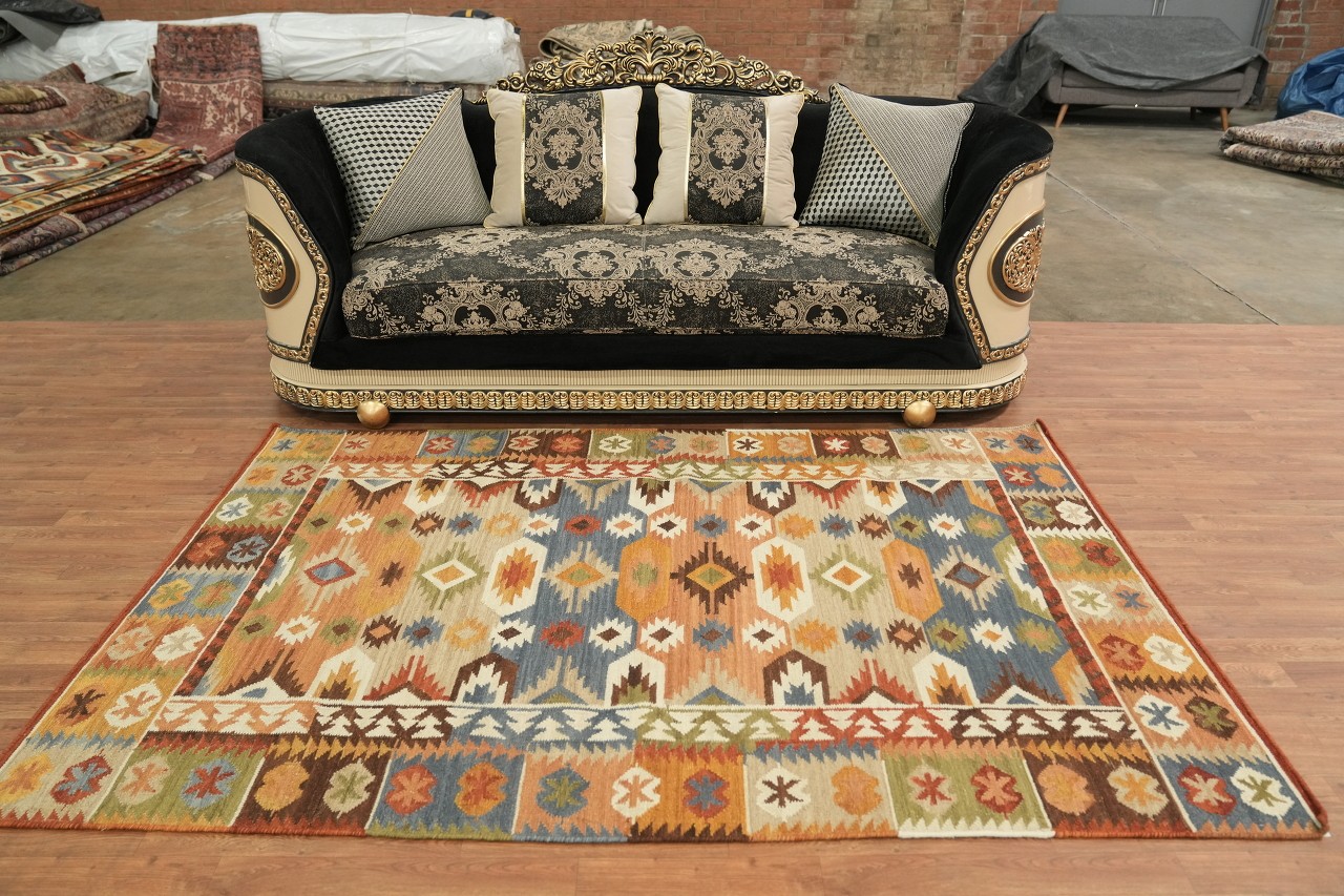 Earthy Hues Meet Traditional Motifs in 5×8 Modern Tribal Rug