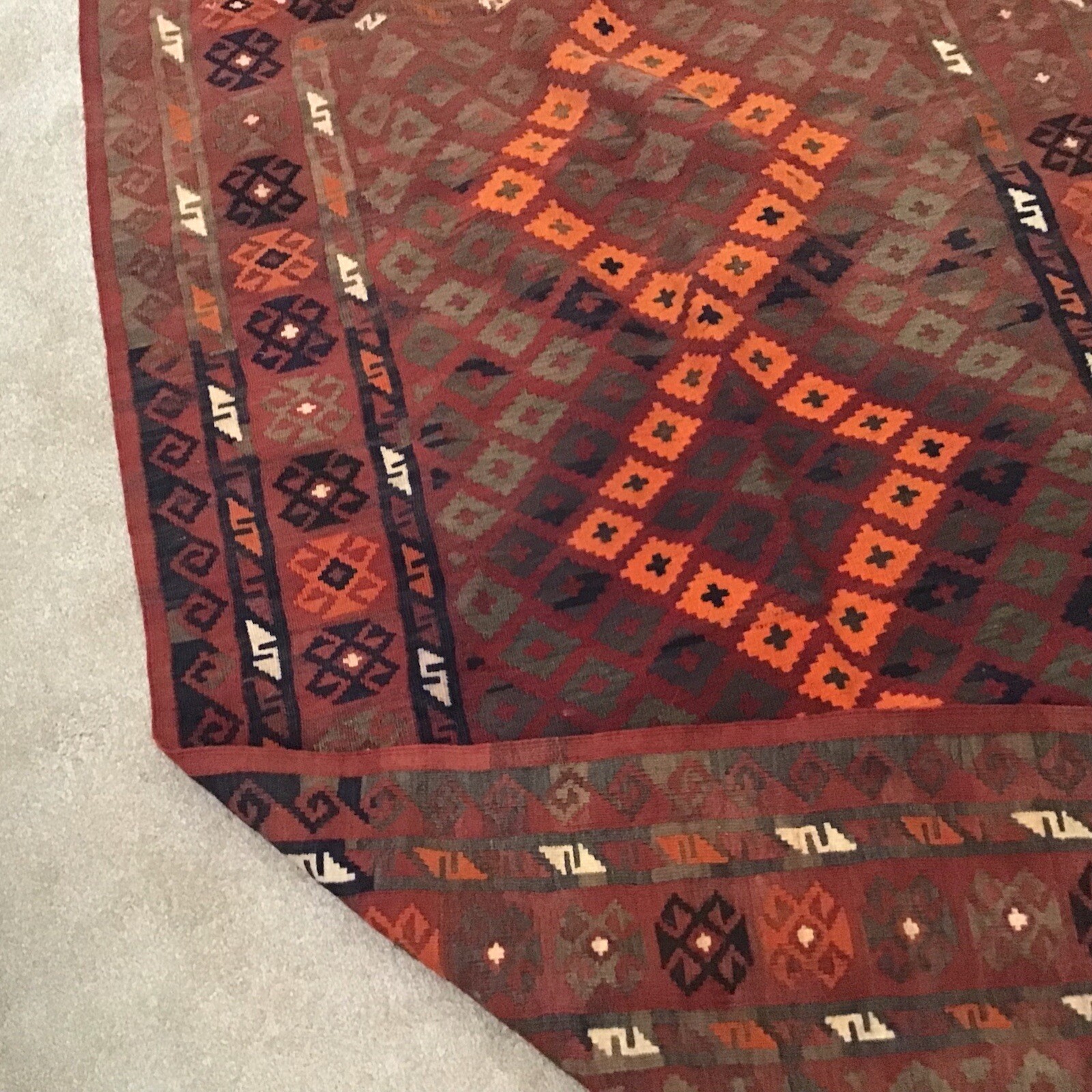 Accent Rug Orange Black and Rust White Color 6’10” long by 3’ 10” wide