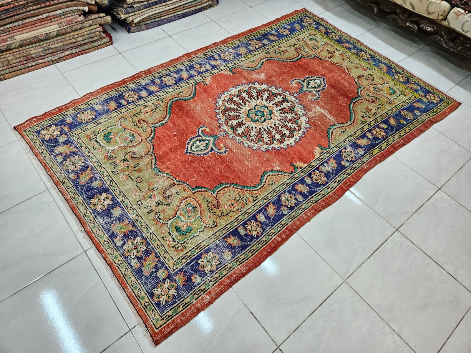 5.3 x 8.7 ft Turkish Area Rug with Central Medallion in Coral Green and Navy