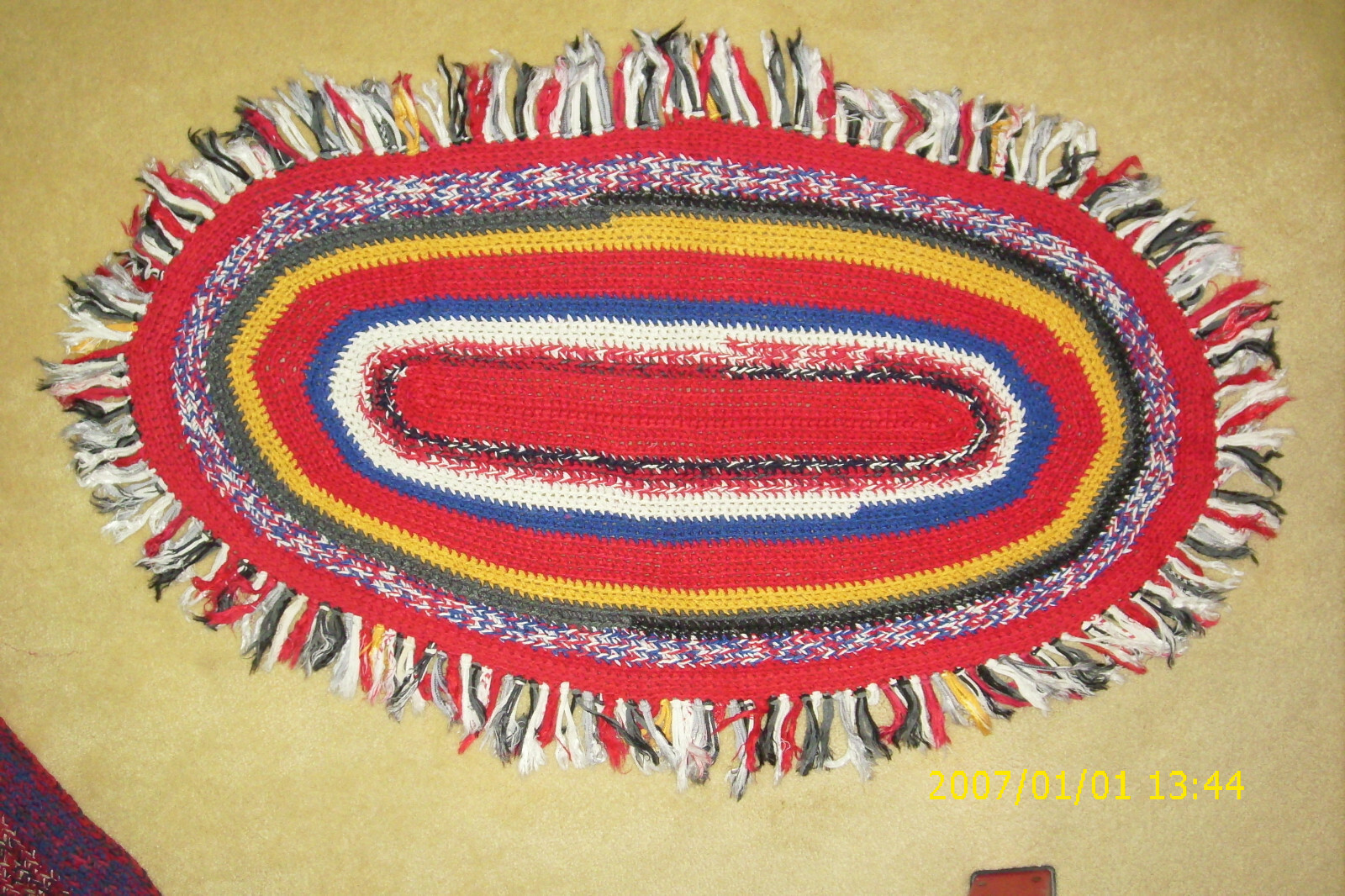 Large 50″ x 30″ Oval Fringed Hand Crafted Crocheted Throw Rug Red Black White