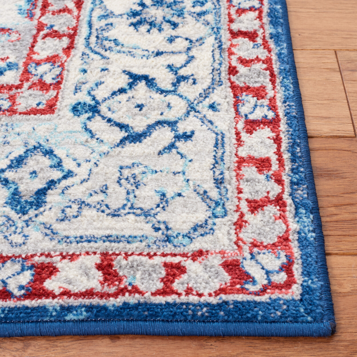 SAFAVIEH Brentwood Collection BNT851P Navy / Red Rug