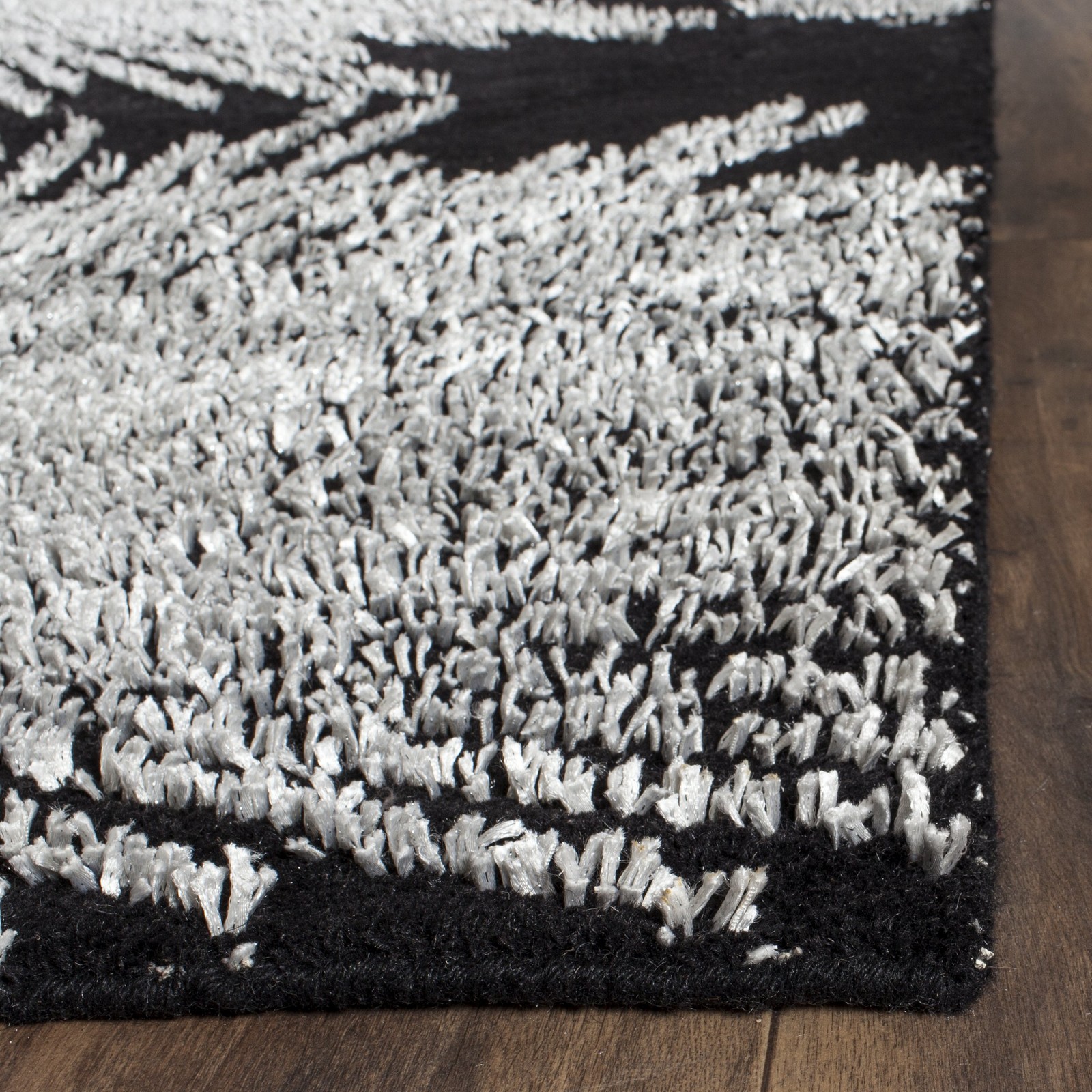 Soho Collection 5′ x 8′ Black / White SOH712D Handmade Starburst Premium Wool…
