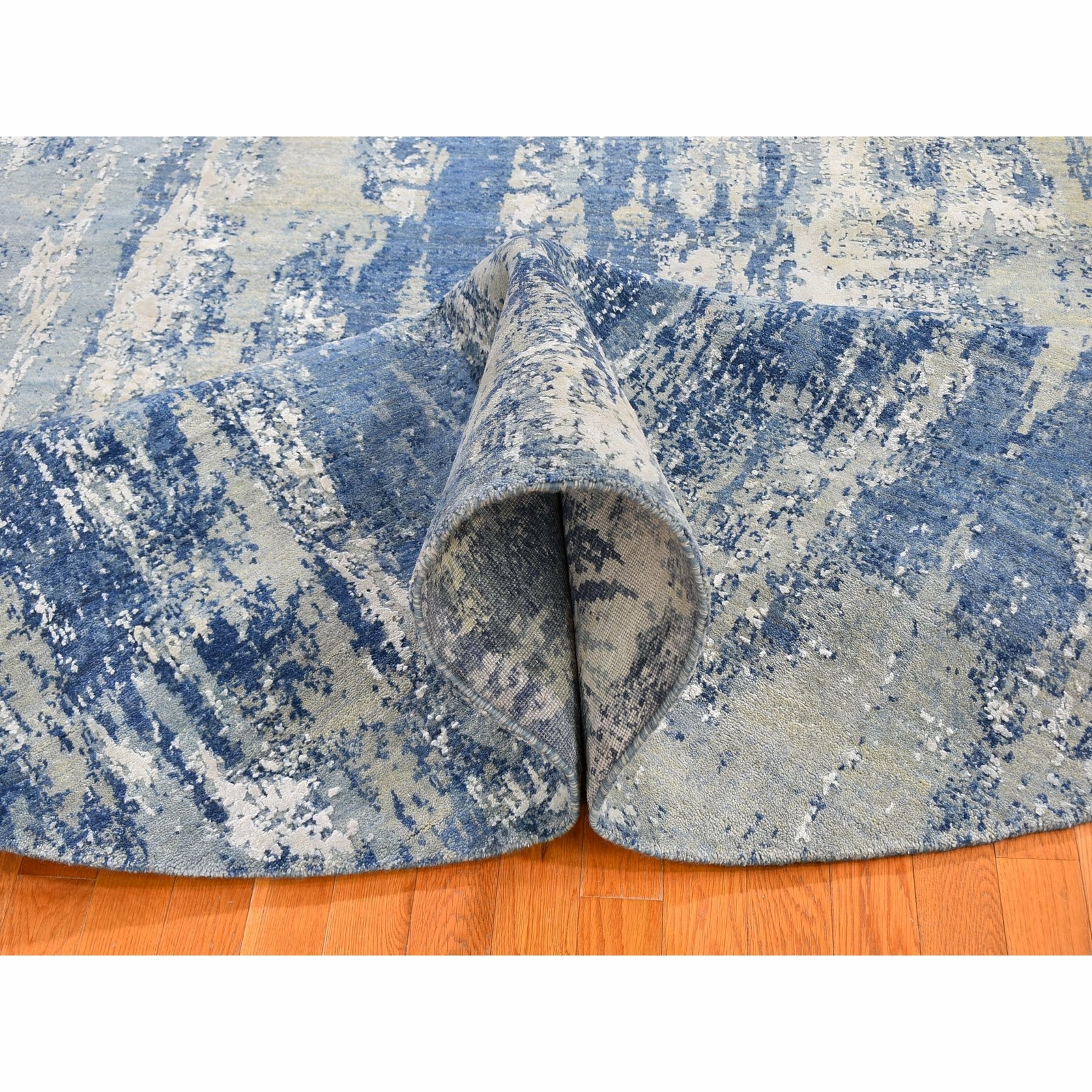 8’1″x10’1″ Blue Abstract Design Wool and Real Silk Oval Hand Knotted Rug R59521