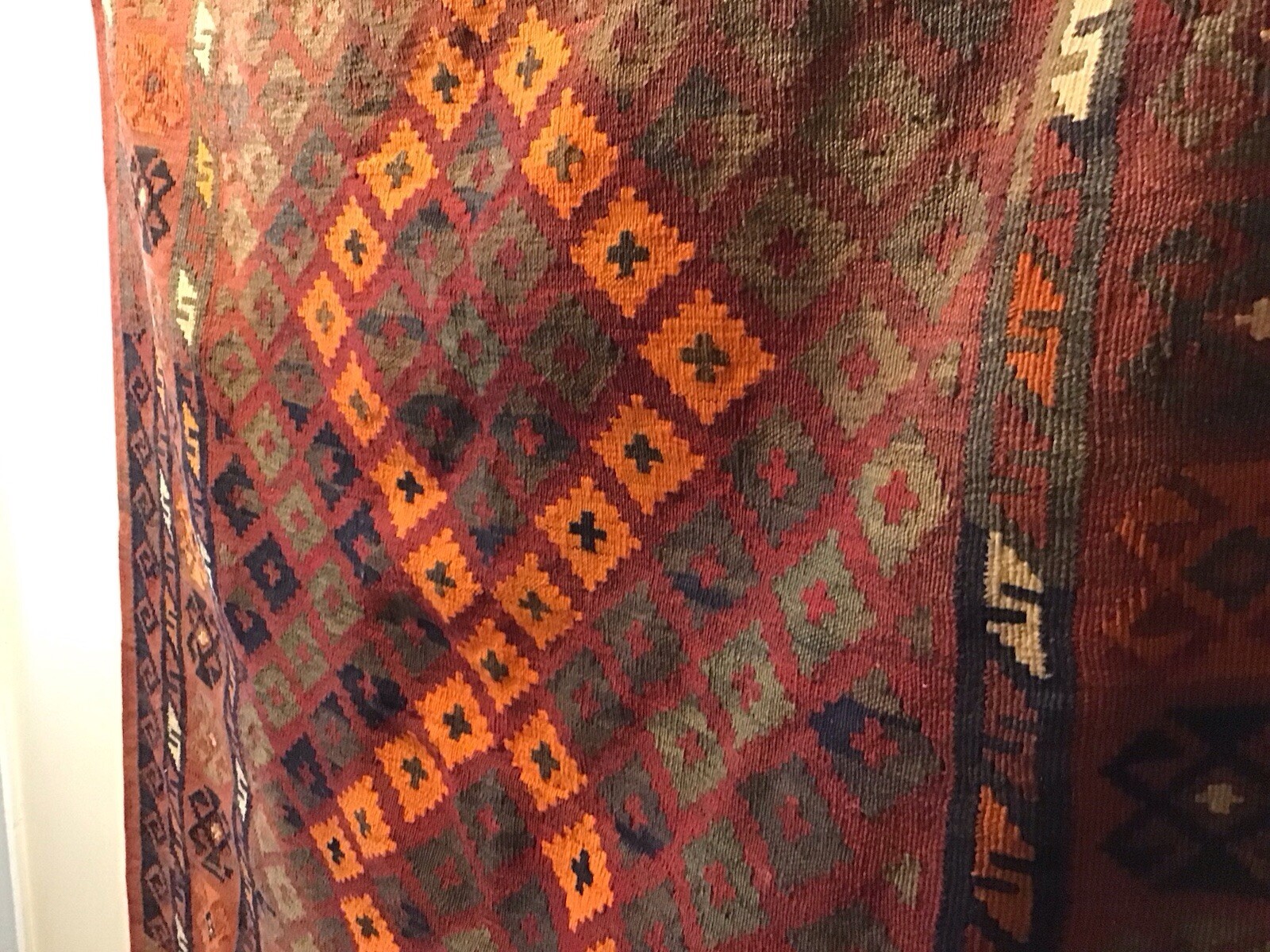 Accent Rug Orange Black and Rust White Color 6’10” long by 3’ 10” wide