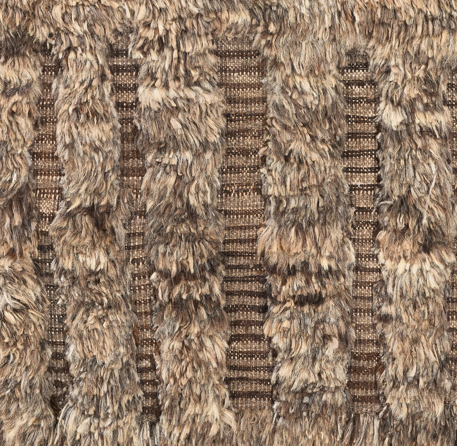 Dashed lines appear hewn into Allali’s plush pile, the meditative grid Moroccan