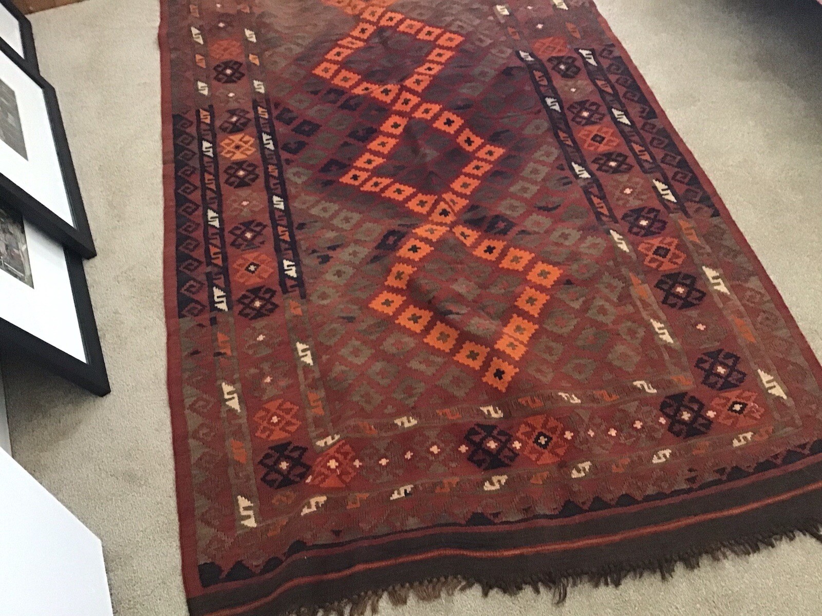 Accent Rug Orange Black and Rust White Color 6’10” long by 3’ 10” wide