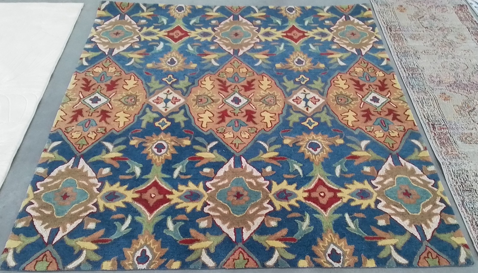 CAMEL / BLUE 6′-0″ x 6′-0″ Back Stain Rug, Reduced Price 1172782202 HG653A-6SQ