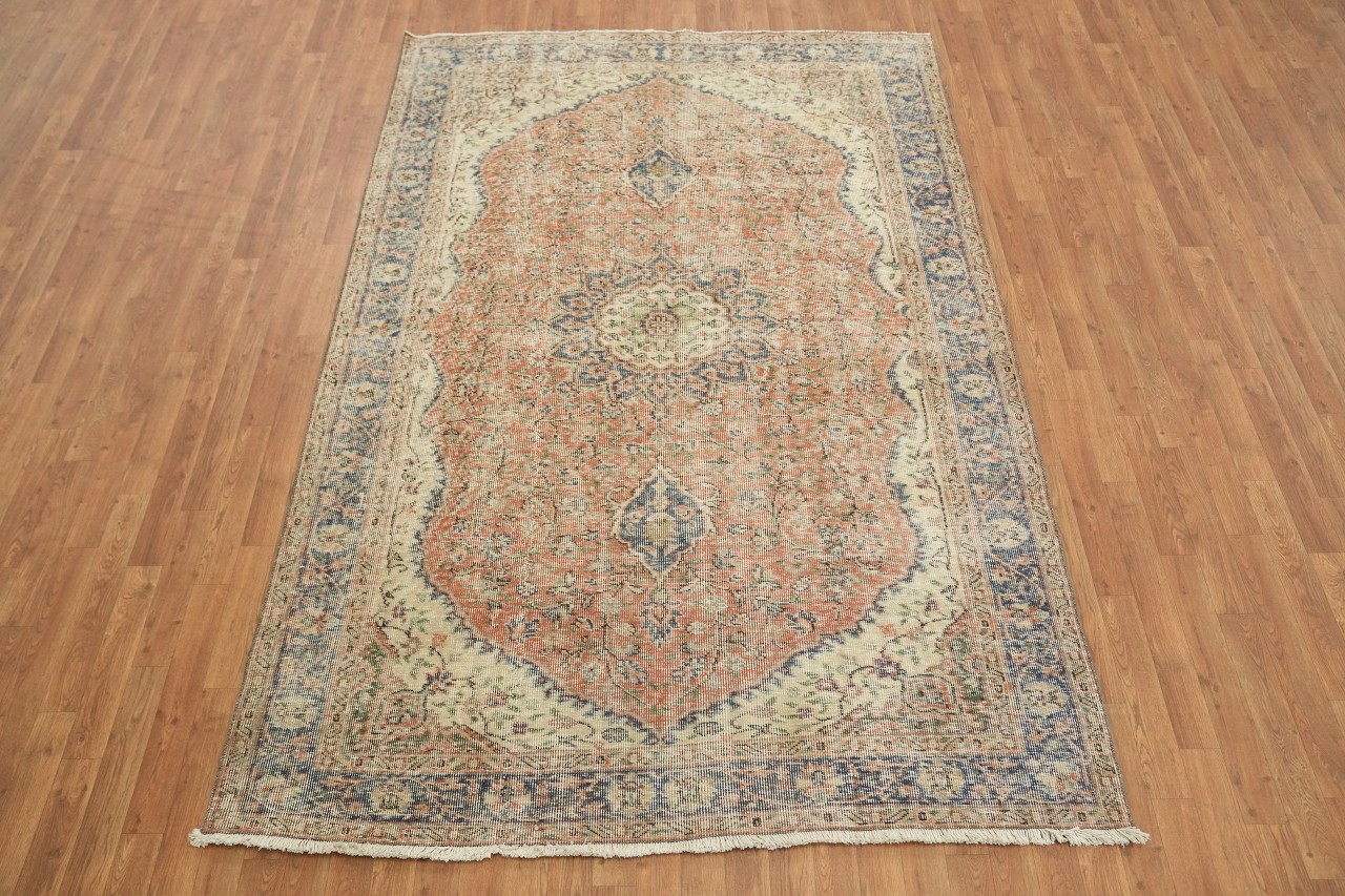 Distressed Anatolian 6×9 Oriental Wool Area Rug in Medallion Oranges & Ivory Hue