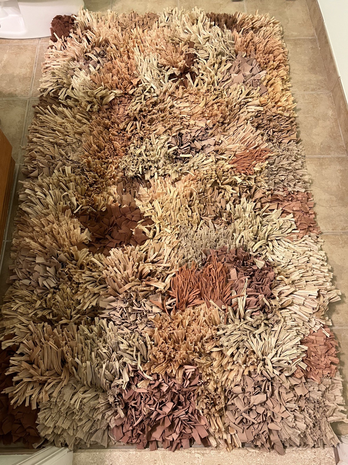 3 1/2 x 5 1/2 feet natural, beige, brown gold colors. Silk shaggy rug carpet
