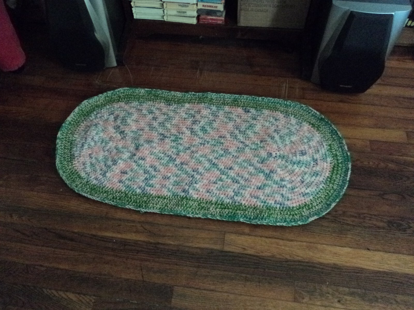 Hand crocheted hand made acrylic yarn oval area rug green pink and blue