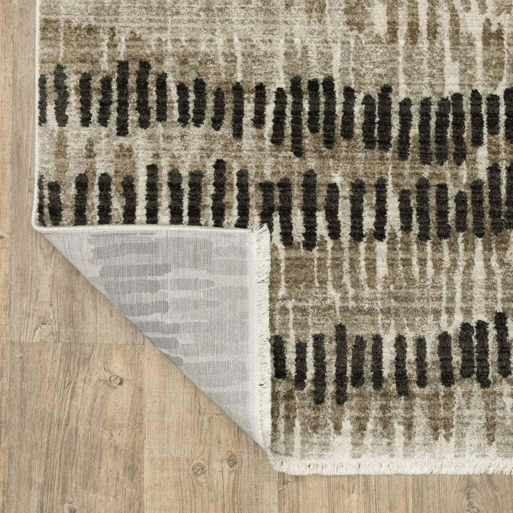 5′ X 8′ Beige Ivory Charcoal Brown Tan And Grey Abstract Power Loom Stain