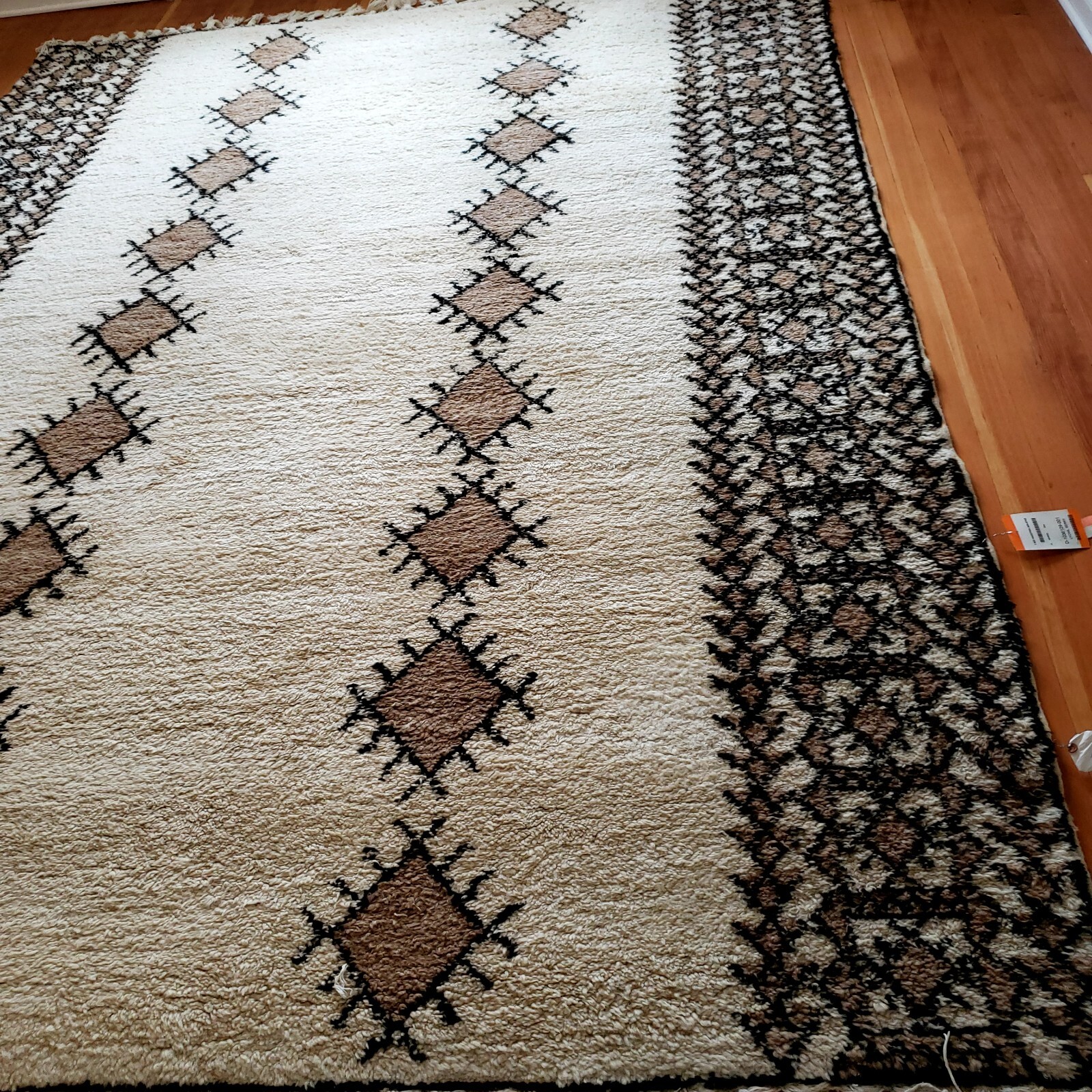 Hand-knotted Moroccan wool rug, very fine weave, high pile, good condition.