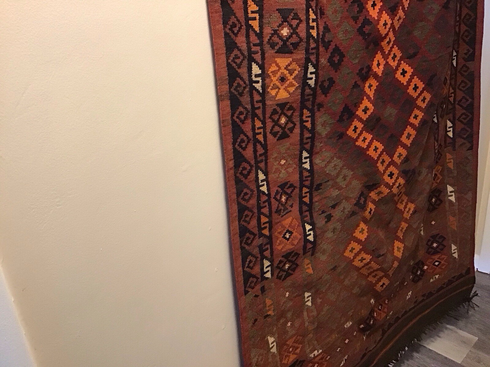 Accent Rug Orange Black and Rust White Color 6’10” long by 3’ 10” wide