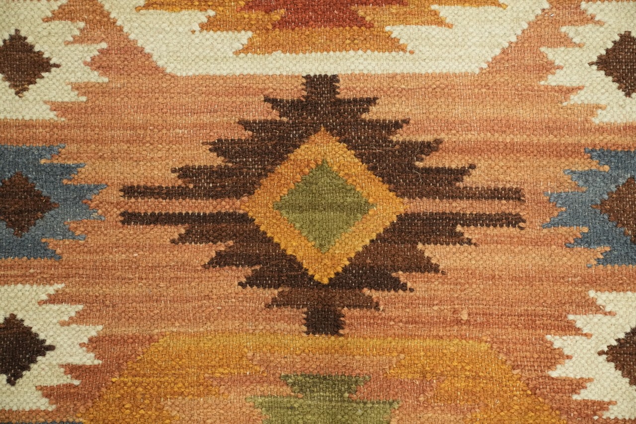 Earthy Hues Meet Traditional Motifs in 5×8 Modern Tribal Rug
