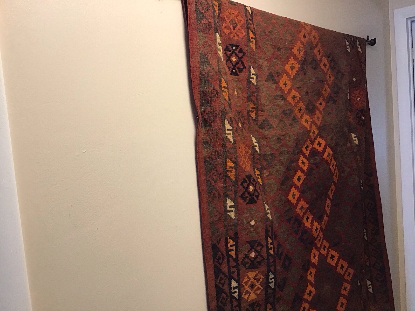 Accent Rug Orange Black and Rust White Color 6’10” long by 3’ 10” wide