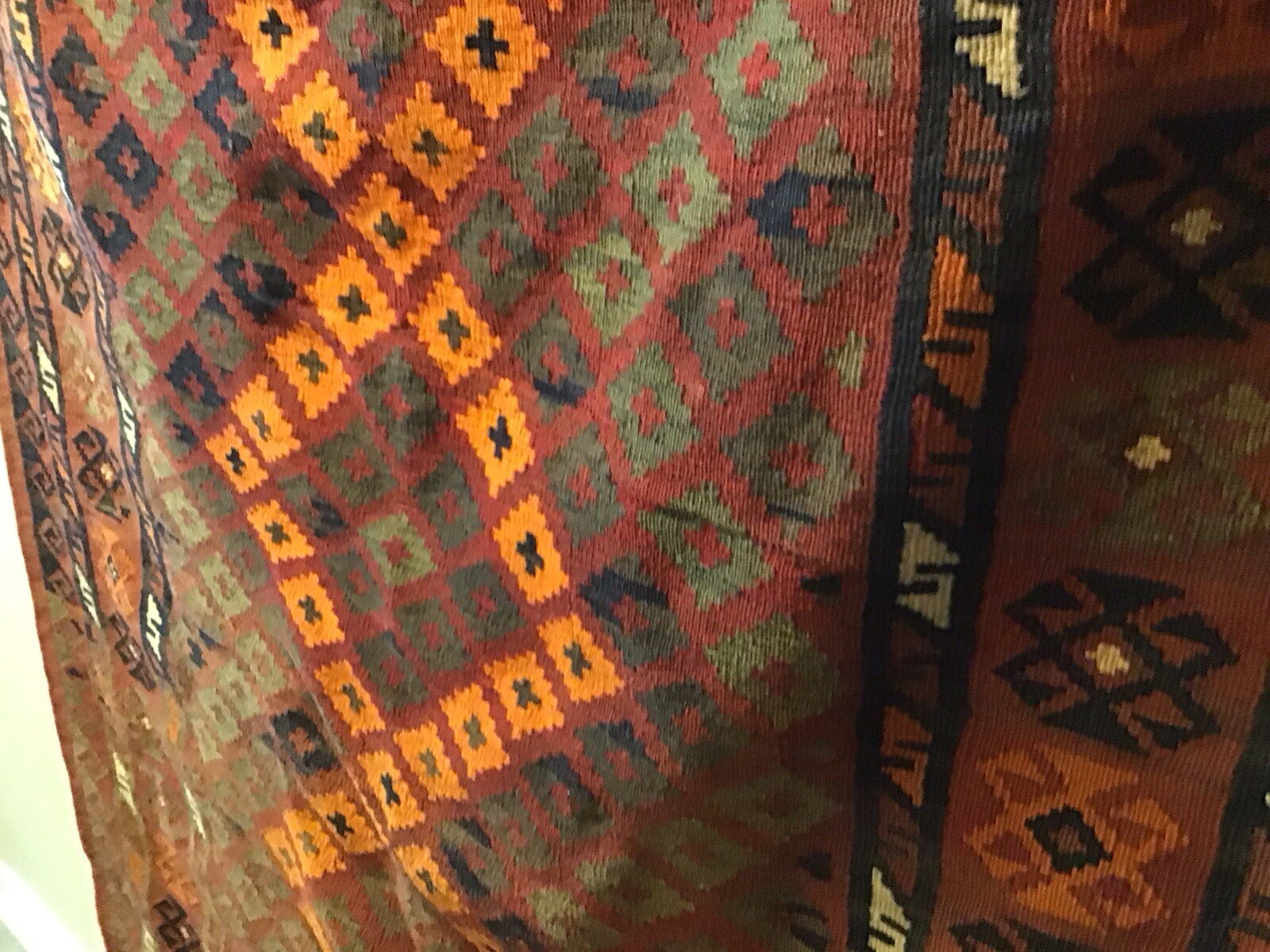 Accent Rug Orange Black and Rust White Color 6’10” long by 3’ 10” wide