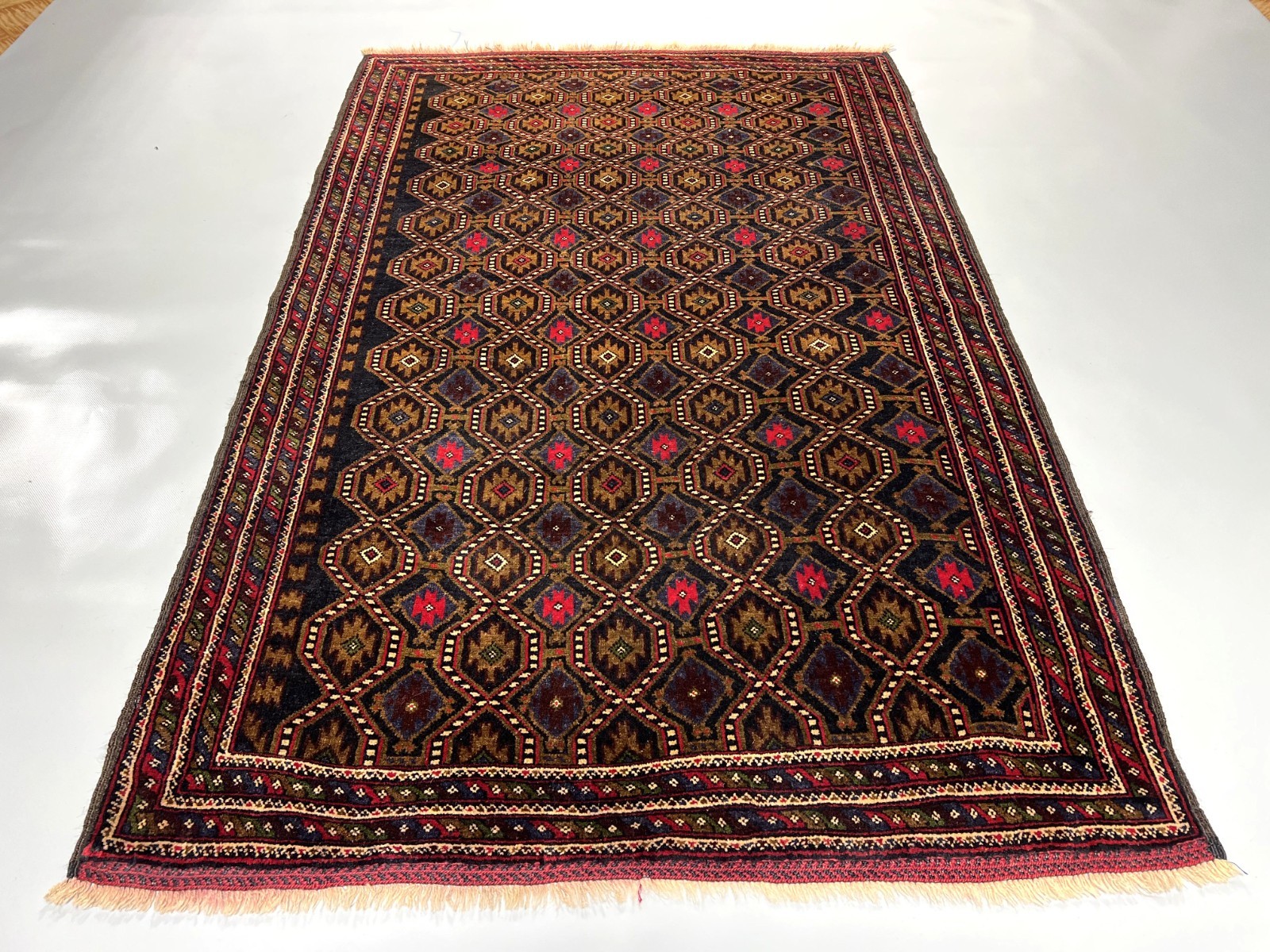 4×6 Vintage Baluchi Rug Hand-Knotted Afghan Wool Carpet with Tribal Gul Motifs