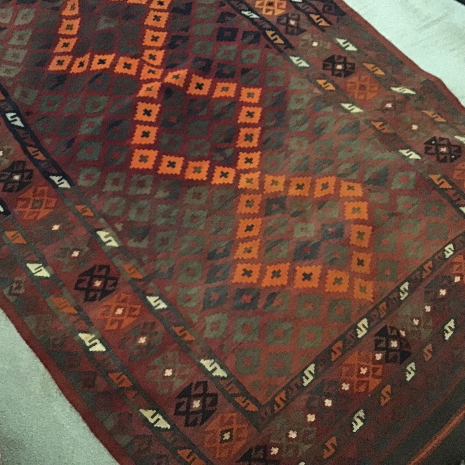Accent Rug Orange Black and Rust White Color 6’10” long by 3’ 10” wide