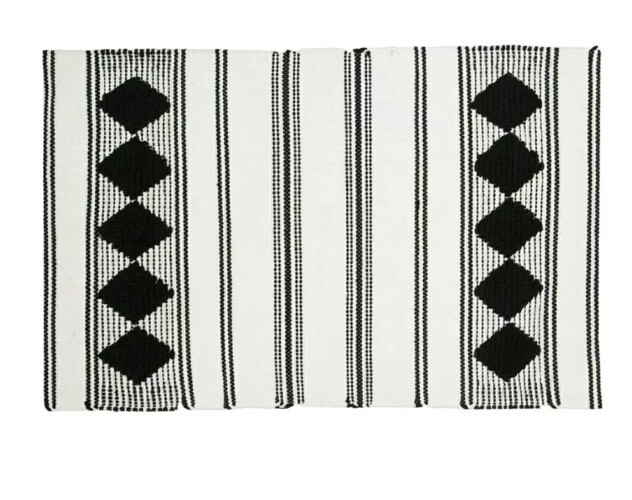 Caravan Diamond Woven Rug from FabFitFun black/white woven rug retail $48.00