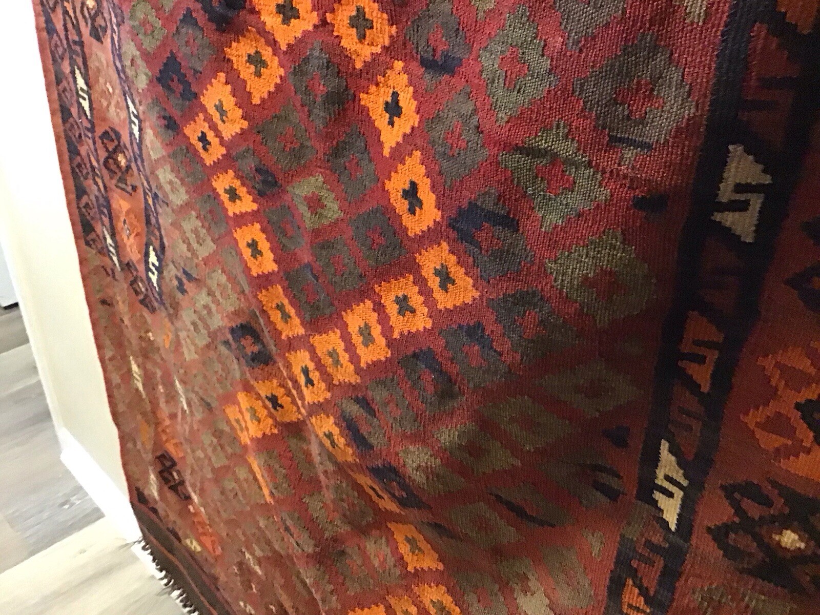 Accent Rug Orange Black and Rust White Color 6’10” long by 3’ 10” wide